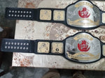 The 84 WWF OLD CLASSIC TAG-TEAM WRESTLING CHAMPIONSHIP BELT. (SAME TWO BELTS )